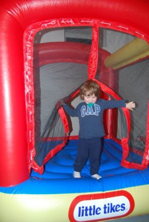 Adam in the bouncy house